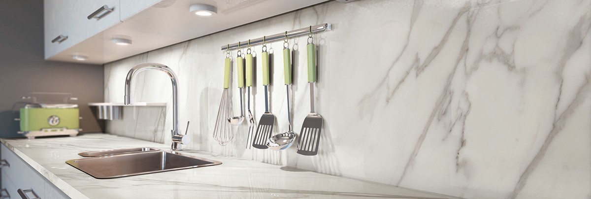 Marble kitchen splashback with appliances neatly organised
