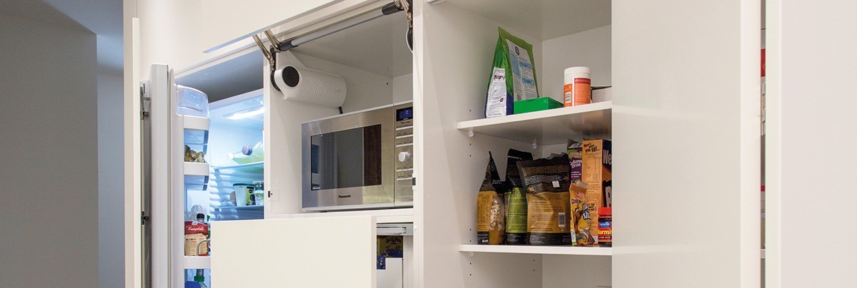 Image of a small kitchen renovated to improve storage space
