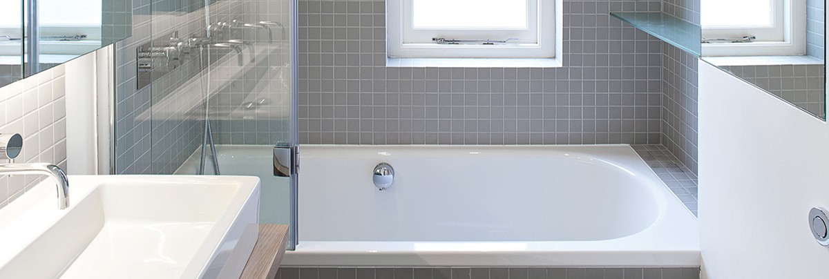 Simple and compact white ensuite.