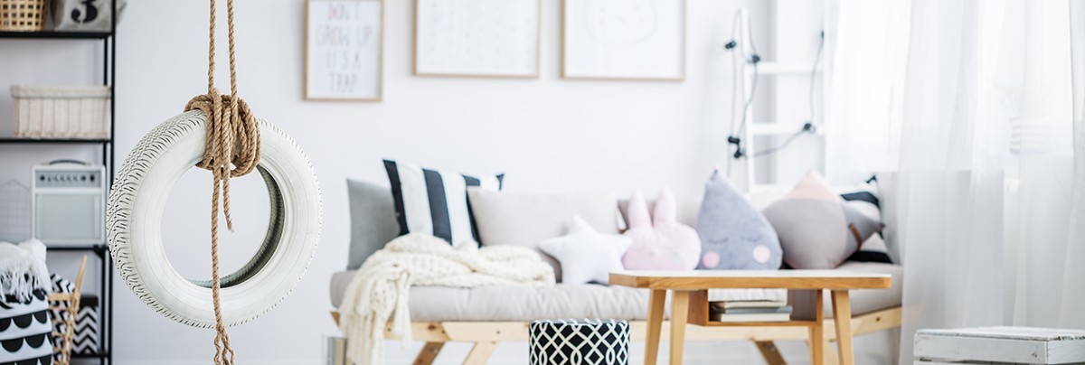 A living room with a creative swing