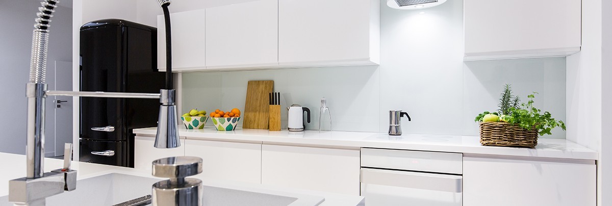 A new kitchen with white benchtop