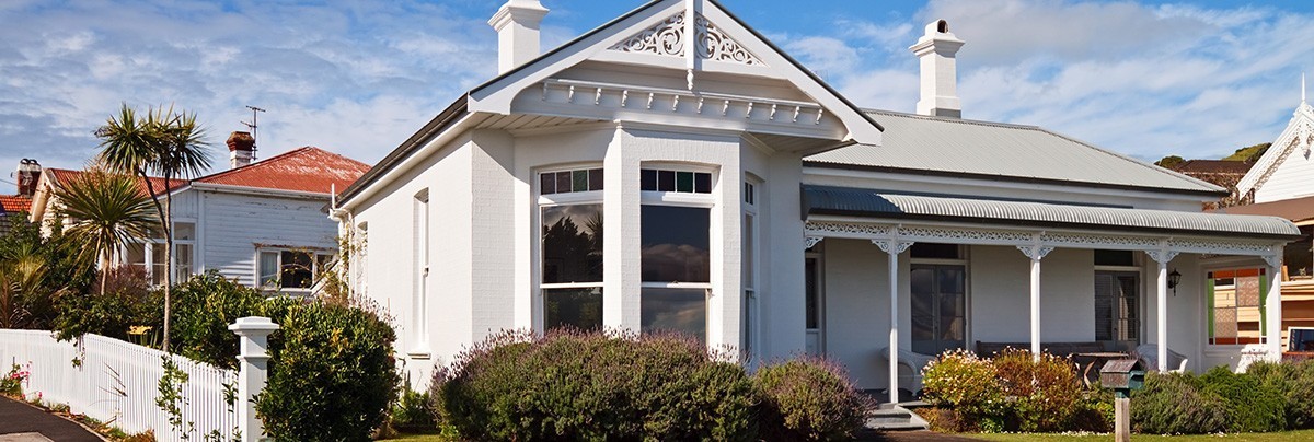 house in new zealand under blue sky