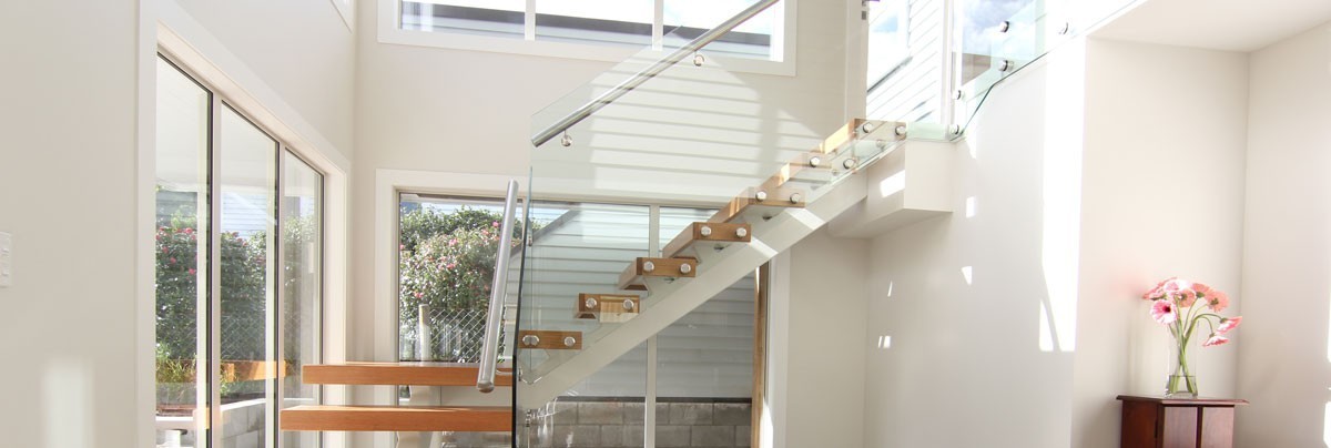 newly renovated entrance with a custom-built white oak staircase