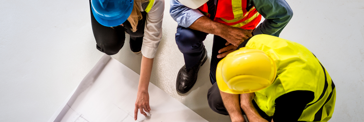 Builders looking at plans