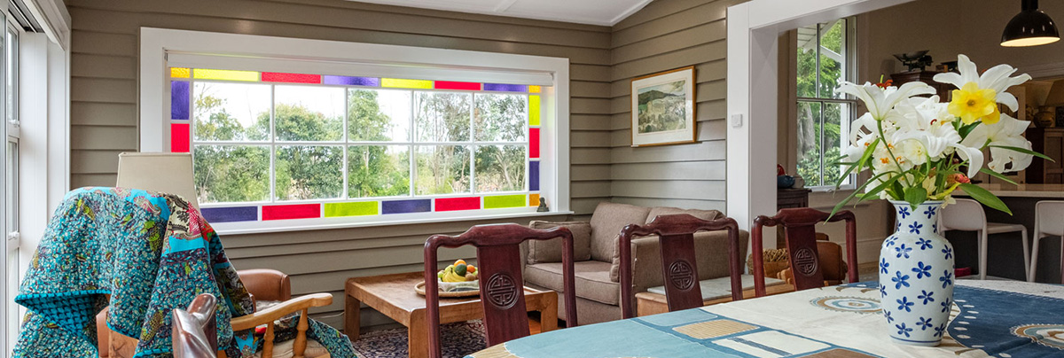 This multi-purpose sunroom is light, bright, and spacious, adding modern functionality to an 1800s home.