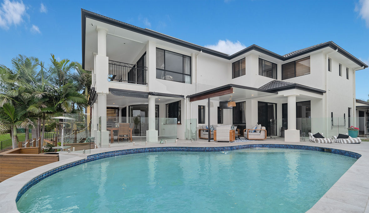 Poolside living: a large oval pool