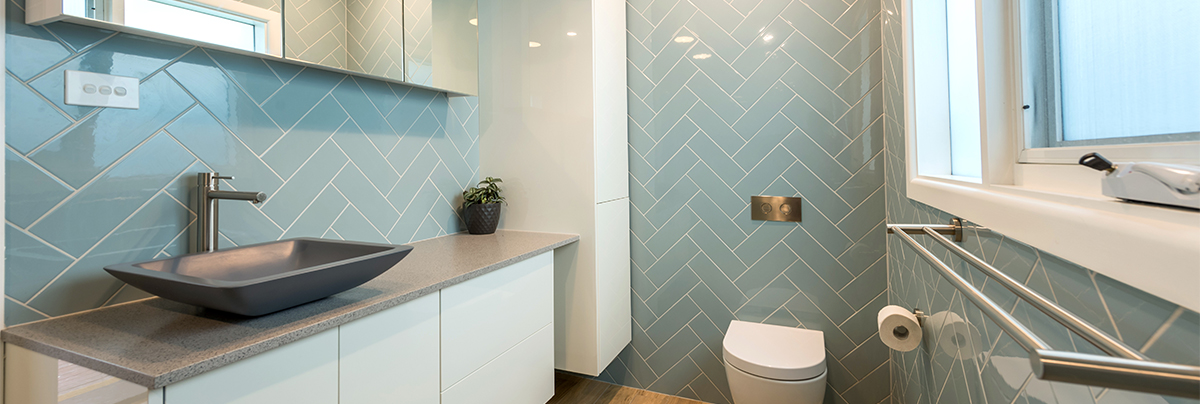 blue-bathroom-with-toilet-and-sink