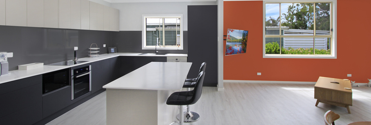 Cluttered weatherboard home to an exciting open plan space in Corrimal, NSW
