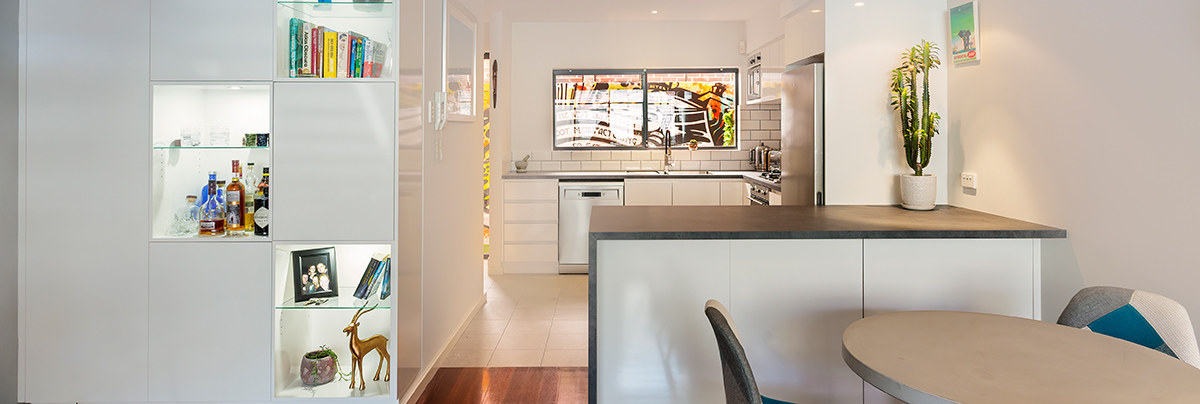 This apartment has been renovated with a contemporary design that enhances its industrial character while improving its functionality.