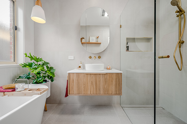 From floor to ceiling, the new bathroom has transformed into a proper urban retreat.