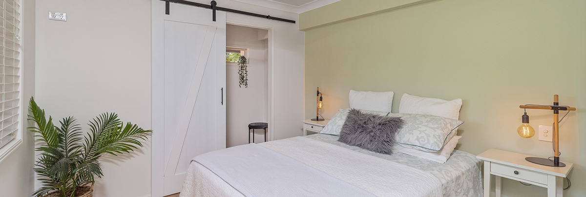 This thoughtful conversion took an underutilised garage and transformed it into a smart and stylish guest space.