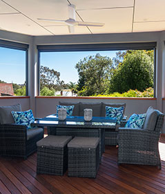 An upgrading outdoor space with chairs and table