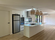 What began as an internal renovation eventually became an all-encompassing refresh of this secluded suburban property.