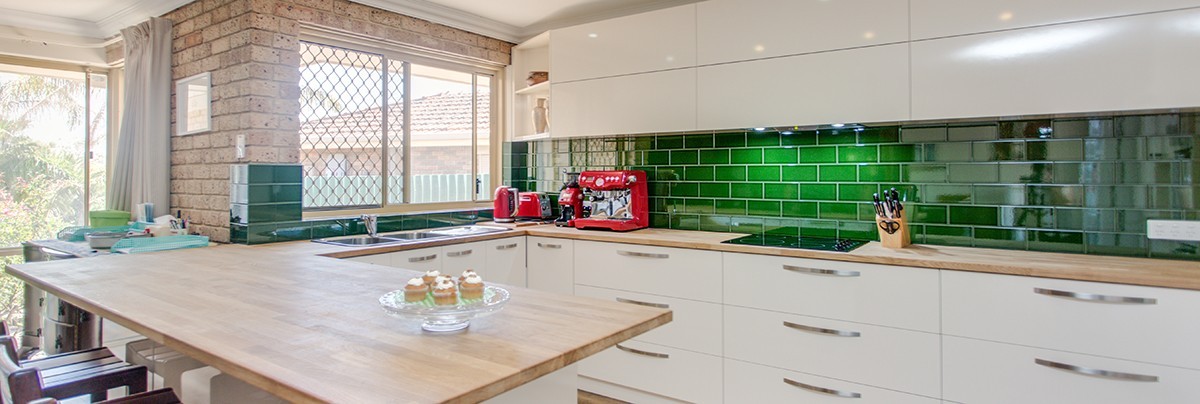 The funky subway tiles give the kitchen a new life and is the wow factor.