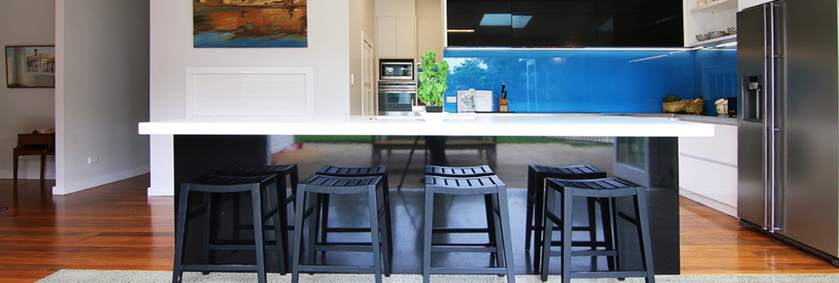 The new renovated kitchen with a blue splashback