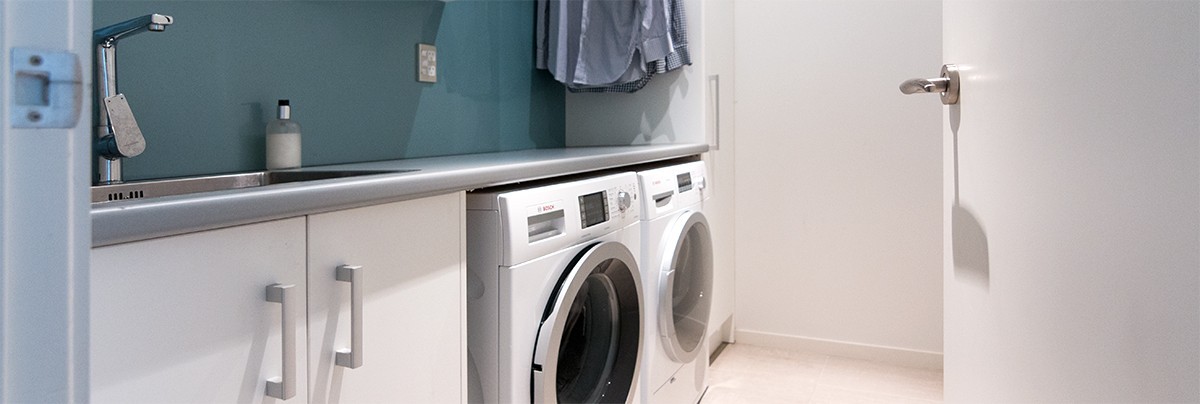 A new laundry room with extra stoarage
