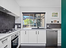 A house renovation transformed by natural light in Wattle Downs, Auckland.
