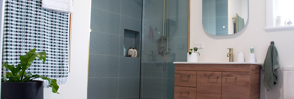 This renovation project enhanced practicality through modern features \u2013 without losing the bathroom's 1930s colourful charm.