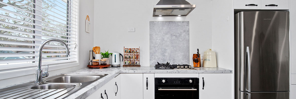Garage conversion to a compact townhouse in Auckland, New Zealand