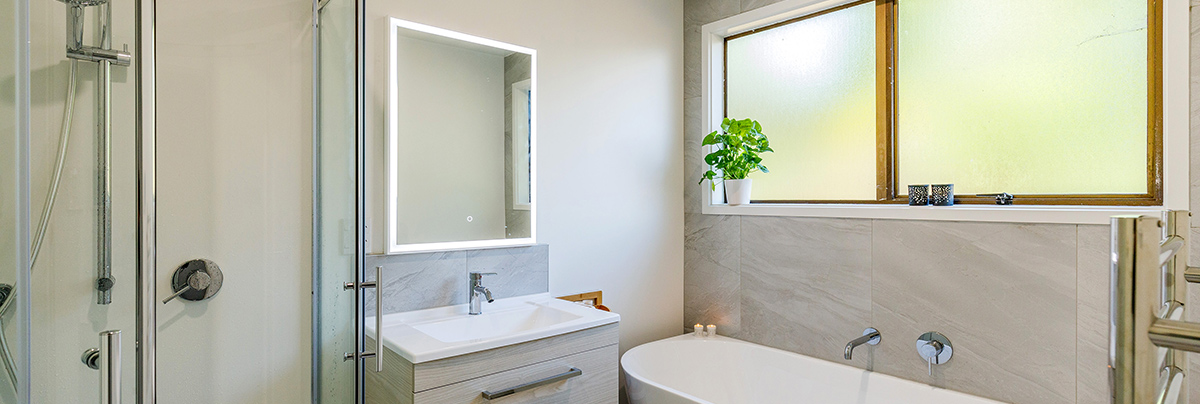 Clearing out the dated interior of this 1970s bathroom created a blank canvas for a modern makeover. The results of which are brilliant.