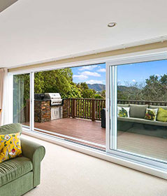 Renovated deck with a built in barbaque creating a smooth indoor to outdoor flow in wellington