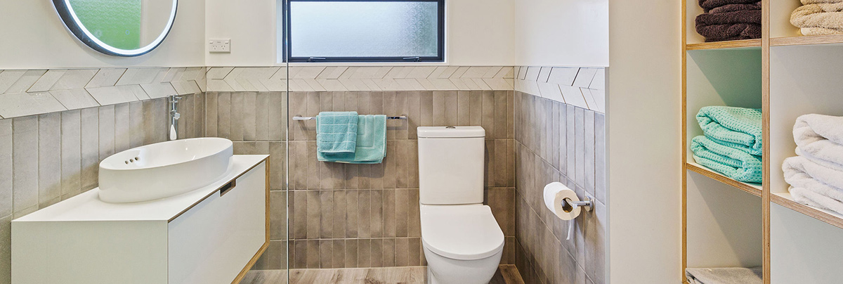 This bathroom renovation modernised the room with a compelling design and maximised the use of available space.