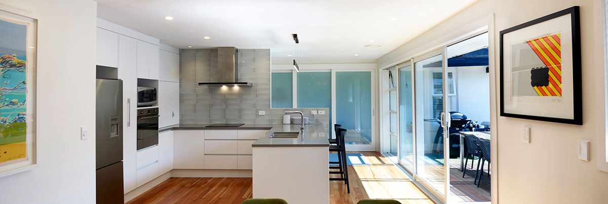 Open-plan functional kitchen and laundry renovation in Mt Eden, Auckland