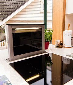 A renovate kitchen with white kitchen countertop