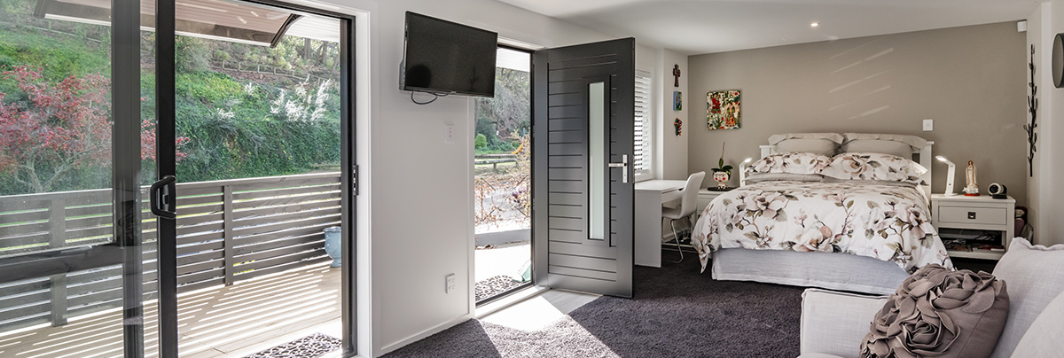 The lower level of this Napier home has been converted into a gorgeous separate dwelling complete with a kitchen, bathroom, laundry, and walk-in scullery.