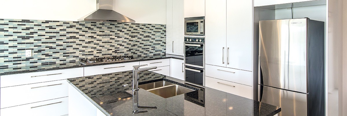 A renovated kitchen layout allows for more open space, due to a different orientation of the kitchen island bench.