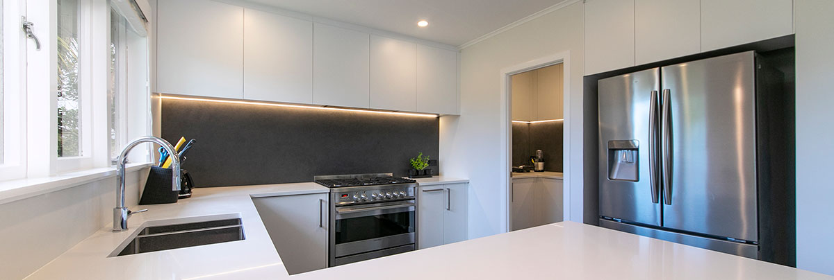kitchen of te atatu home renovated by refresh renovations
