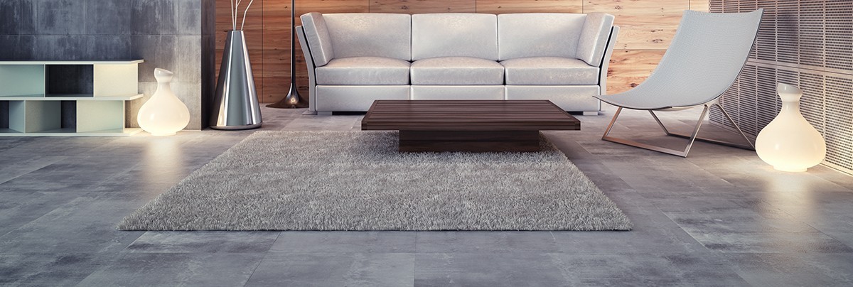 a modern living room with grey tiles floor