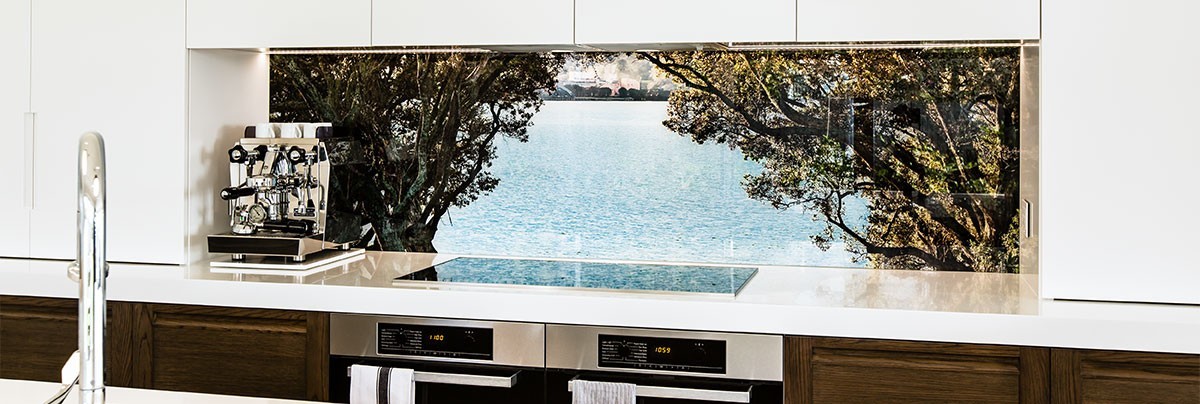 Bay view between trees graphic splashback