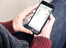 Person monitoring their energy usage from their smartphone