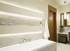 LED strip lighting underneath bathroom shelving