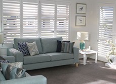White wooden shutter options by Santa Fe Shutters