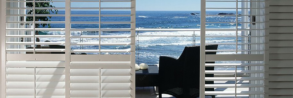 White wooden shutter options by Santa Fe Shutters