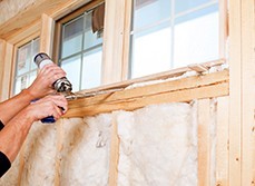 Adding insulation to outer walls and replacing windows with double glazed windows
