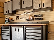 High end garage renovation with storage and designated leisure areas.