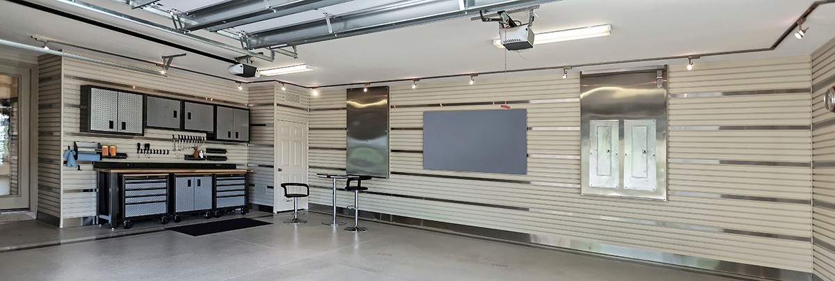 High end garage renovation with storage and designated leisure areas.