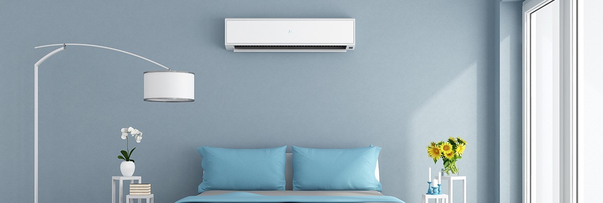 Modern, stylish and minimalist bedroom with an air conditioning system
