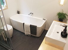 A bathtub with towel