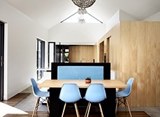 Blue chairs and wooden table