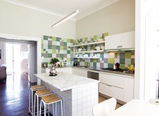 An open kitchen in Parnell with colourful tiles decoration
