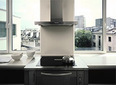 Dark chrome rangehood in kitchen