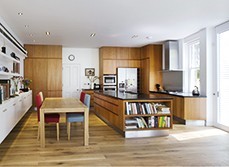 Image by OneShot\/Living4media\/Lene-K of wooden finishes on kitchen\n