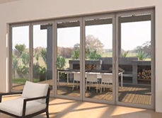 Fletcher Bifold Door connecting living room and outdoor patio.