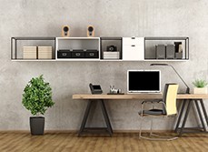 Stylish office with a black and white floating shelf