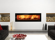 Modern, fixed wood fire burner installed into wall.