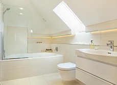 A new bathroom with bathtub and shower